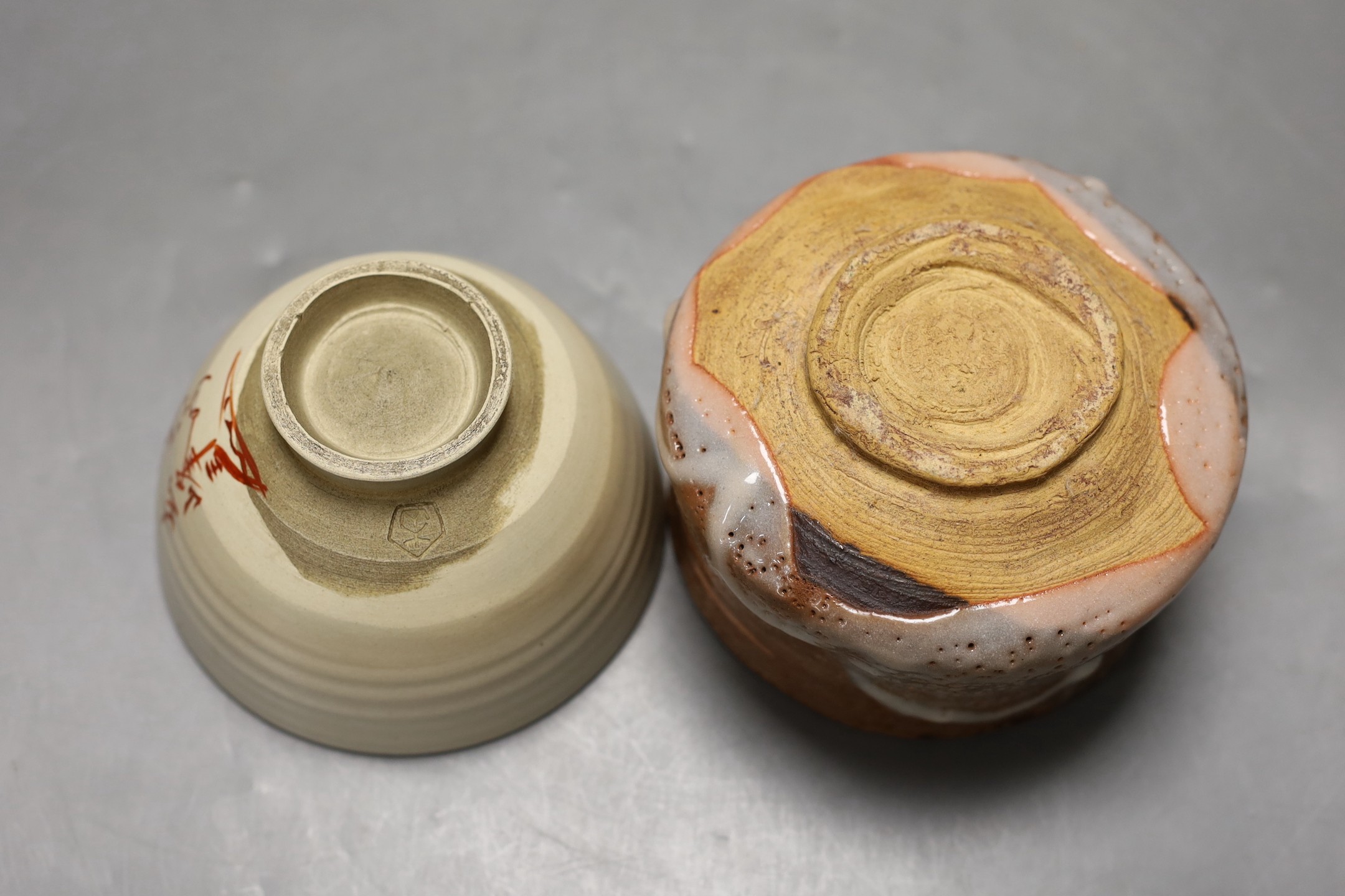 Two Japanese studio pottery chawan tea bowls, one with raku glaze, 12cm diameter